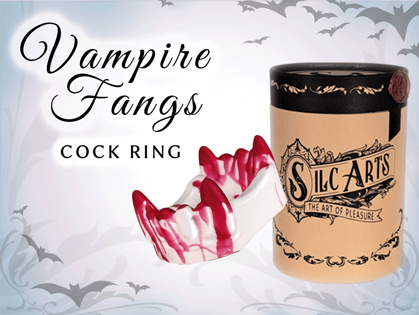 Pic of a set of silicone Vampire Fangs cock ring dripping with blood. Behind it is an ornate round packaging box. Bats are flying in the background.