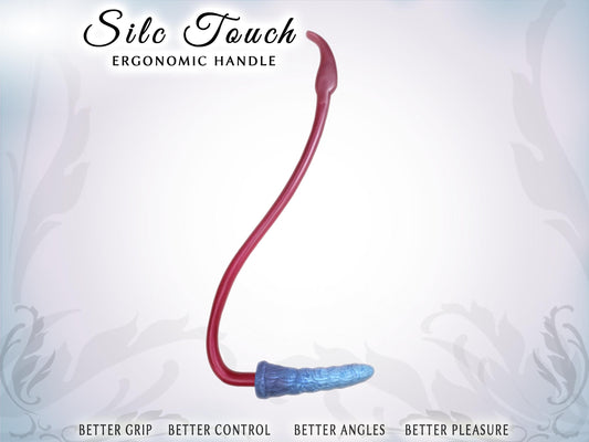 Pic shows a tall, vertical, elegantly curved handle with a dildo at the base, perpendicular to the handle. Top of pic says Silc Touch ergonomic handle. Bottom say Better grip, better control, better angles, better pleasure.