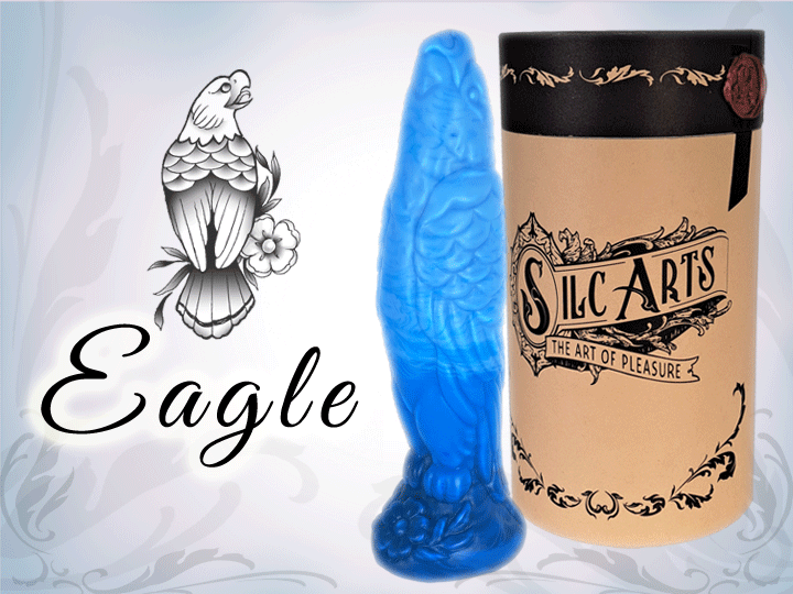 A blue silicone dildo designed to resemble an eagle, standing upright. It comes in a classy cylindrical package with the brand name 'Silc Arts' displayed.