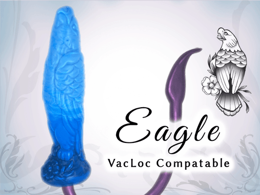 A blue silicone dildo with an eagle design, alongside a purple handle, with the text 'Eagle VacLoc Compatible' displayed.
